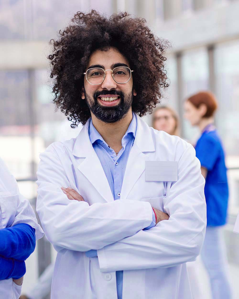 group of doctors standing in corridor on medical c 5nqgmqb.jpg